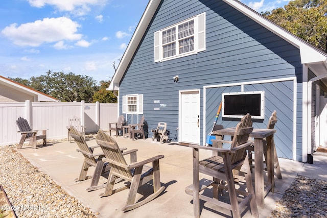 back of house with a patio area