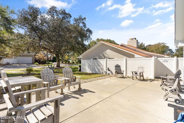 view of patio / terrace with a garage