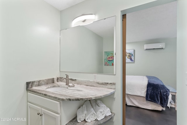 bathroom with vanity and a wall mounted AC