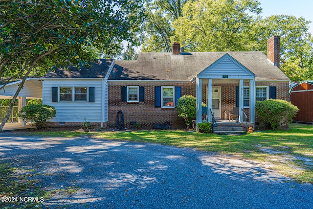 view of front of home with a front yard