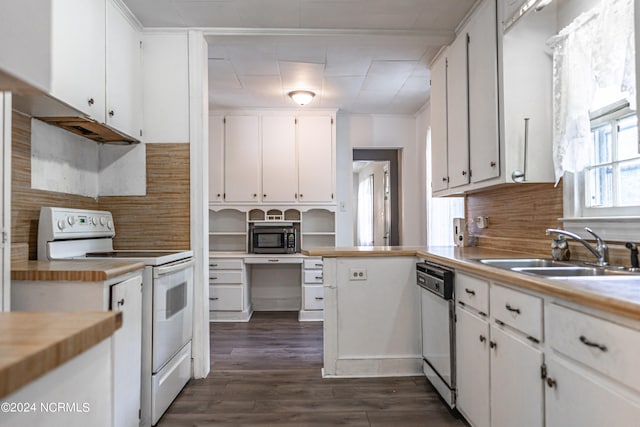 kitchen featuring white appliances, sink, backsplash, white cabinets, and dark hardwood / wood-style floors