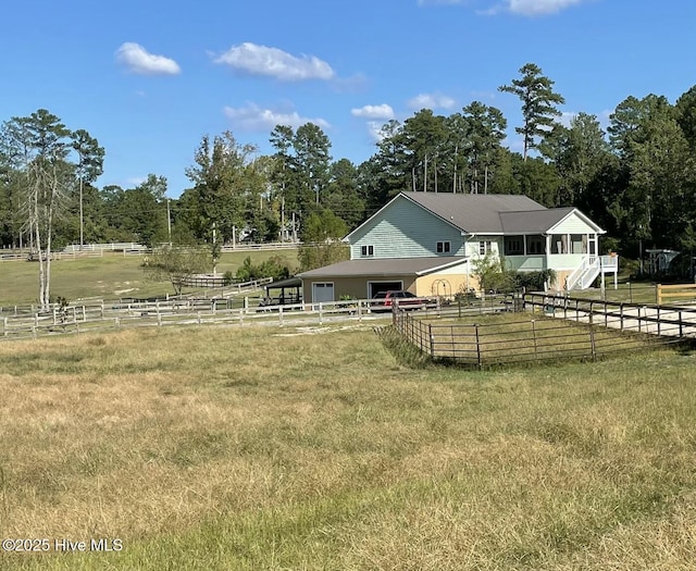 exterior space featuring a rural view