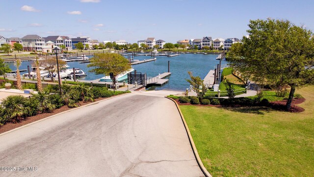 103 Cumberland St, Newport, NC 28570 - water view featuring a boat dock, a boat ramp, and nearby suburban area