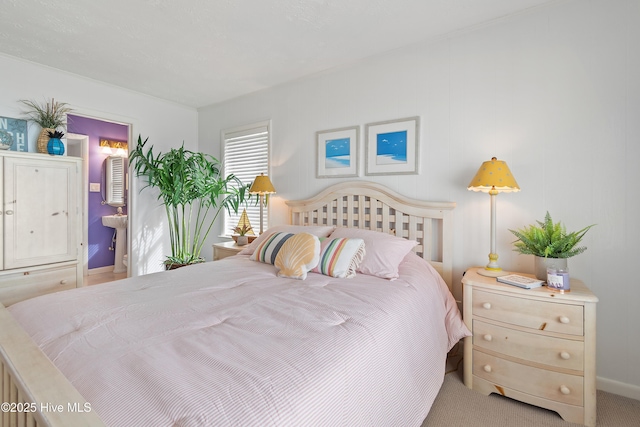 bedroom featuring light colored carpet