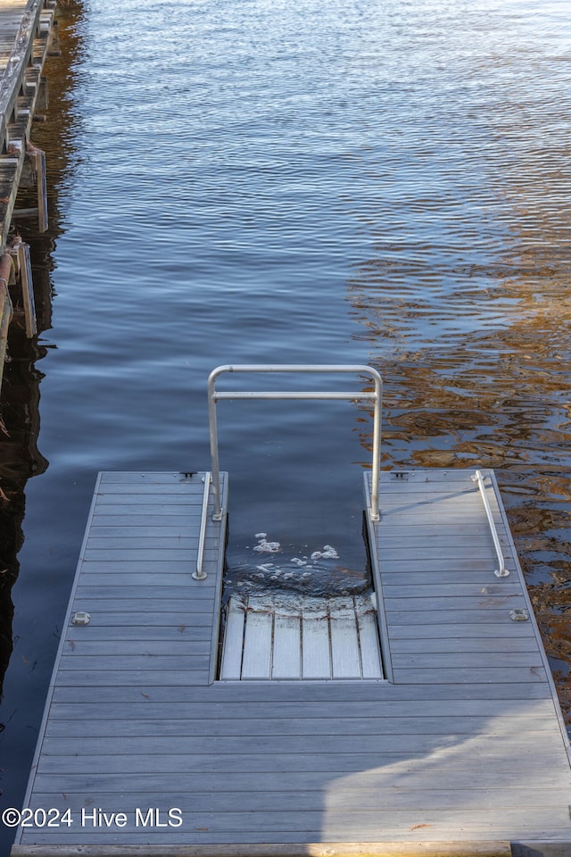 view of dock with a water view