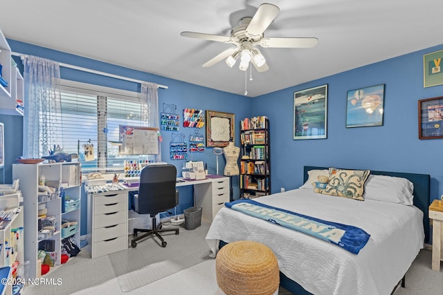 bedroom with light carpet and ceiling fan