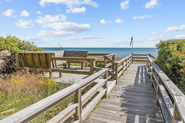 view of dock with a water view