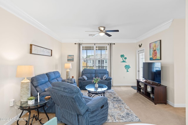 living room featuring crown molding, light carpet, and ceiling fan