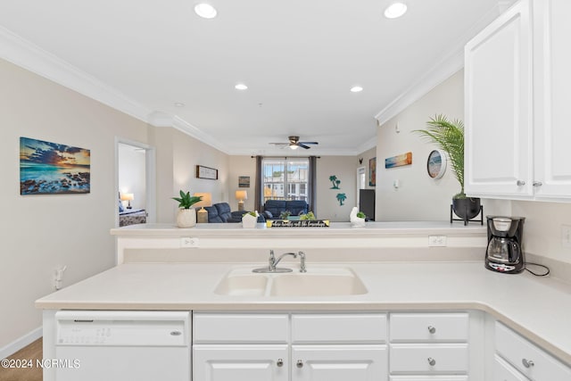 kitchen featuring kitchen peninsula, white cabinetry, ornamental molding, dishwasher, and sink