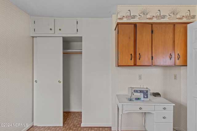 interior space featuring white cabinetry