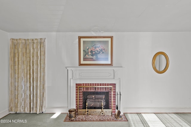 unfurnished living room featuring carpet and a fireplace