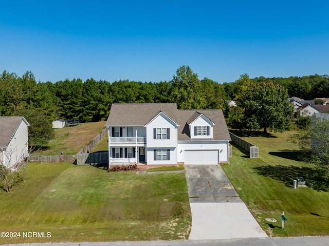 view of front of house featuring covered porch and a front lawn