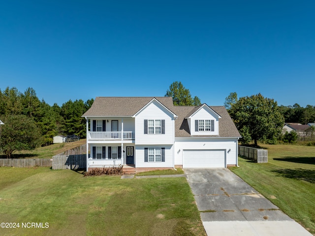 view of front of house featuring covered porch, a garage, a front yard, and a balcony