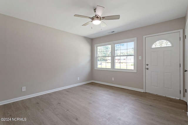 entryway with hardwood / wood-style floors and ceiling fan