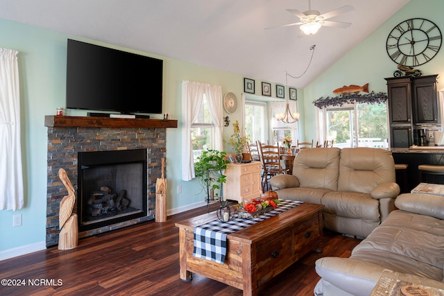 living room with vaulted ceiling, ceiling fan, dark hardwood / wood-style floors, and plenty of natural light