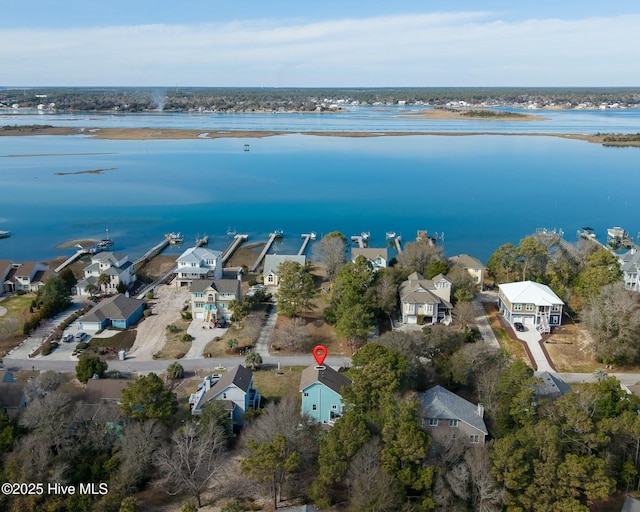 bird's eye view featuring a residential view and a water view