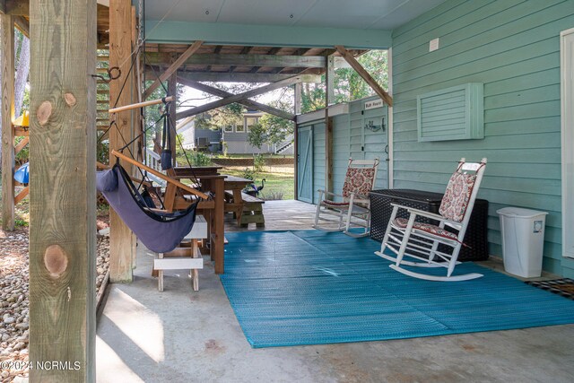 view of patio featuring a wooden deck