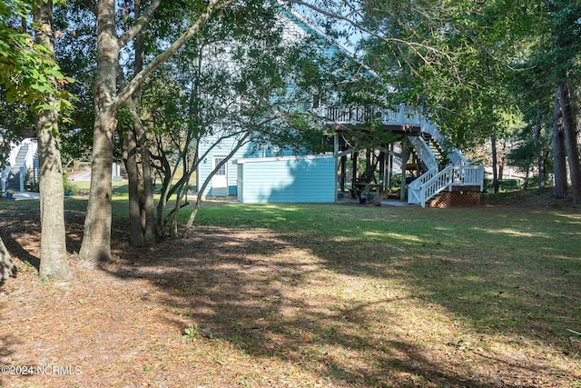 view of yard featuring a deck