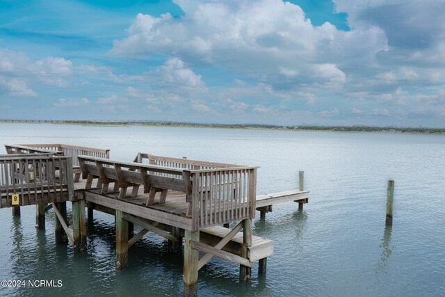 view of dock with a water view