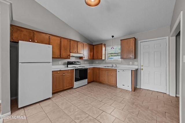 kitchen with white appliances, sink, hanging light fixtures, lofted ceiling, and light tile patterned floors