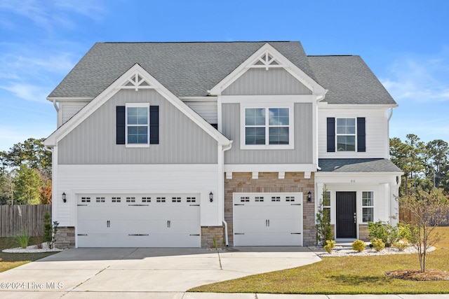 craftsman house featuring a garage