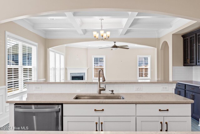 46 Covey Ct, Hampstead, NC 28443 - kitchen featuring dishwasher, a sink, beamed ceiling, ceiling fan with notable chandelier, and open floor plan