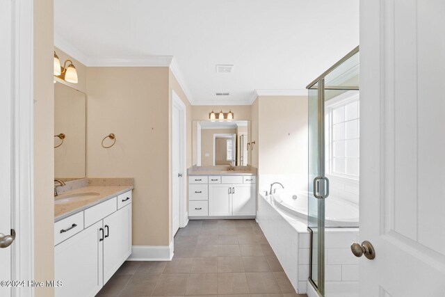 46 Covey Ct, Hampstead, NC 28443 - full bath with a sink, two vanities, a stall shower, and ornamental molding
