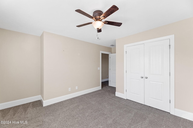 unfurnished bedroom featuring a closet, ceiling fan, and carpet flooring