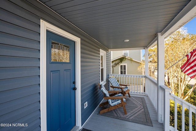 deck featuring covered porch