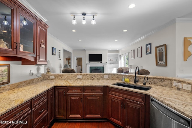 kitchen with light stone counters, ornamental molding, sink, and stainless steel dishwasher