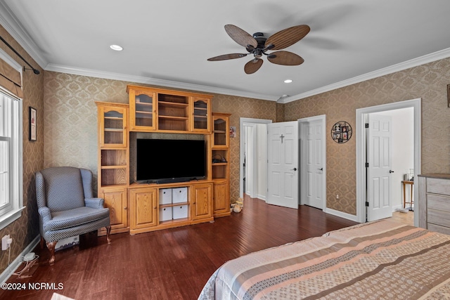 bedroom with ceiling fan, ornamental molding, and dark hardwood / wood-style floors