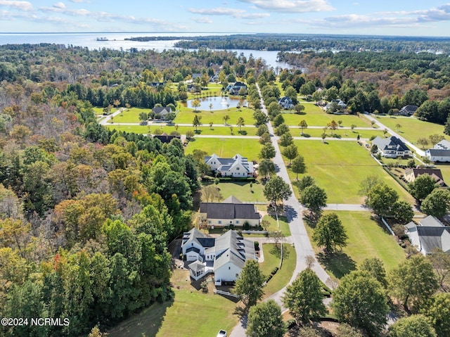 drone / aerial view featuring a water view