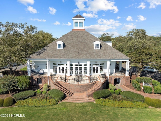 back of house with a patio, ceiling fan, and a yard