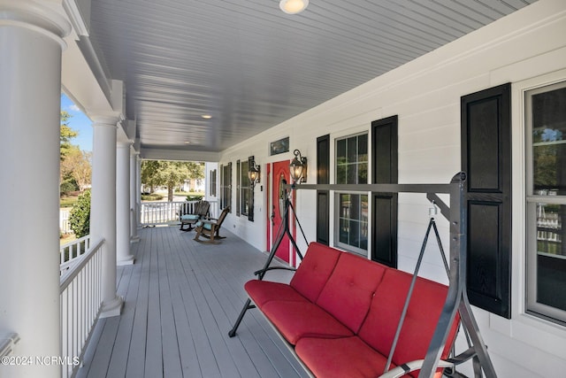 wooden deck with a porch