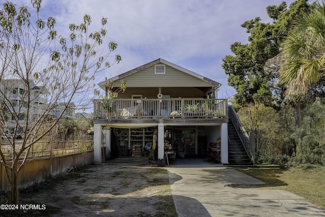 view of front facade with a carport