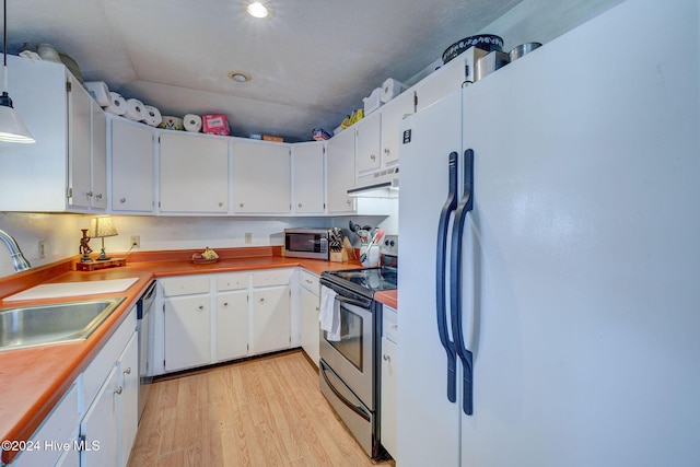 kitchen featuring white cabinetry, appliances with stainless steel finishes, sink, and light hardwood / wood-style flooring