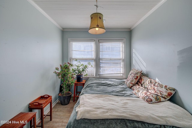 bedroom with crown molding