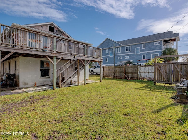 view of yard with a deck