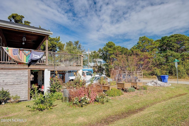 view of yard featuring a deck