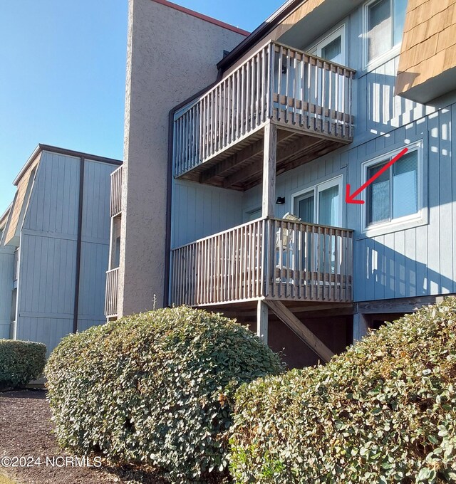 view of property exterior featuring a balcony