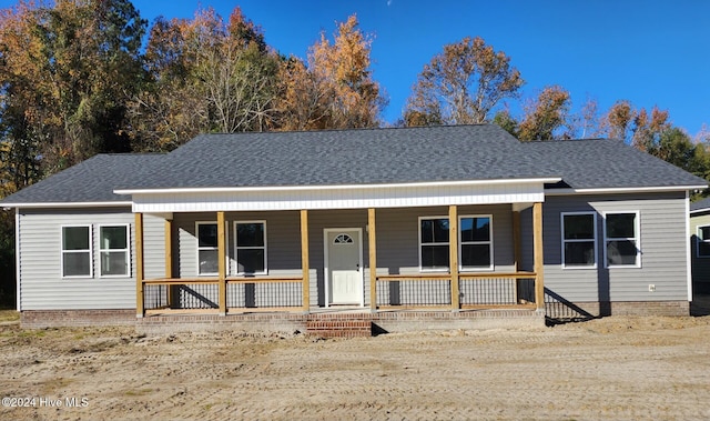 view of front of home featuring covered porch