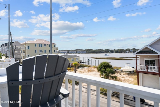 deck featuring a water view