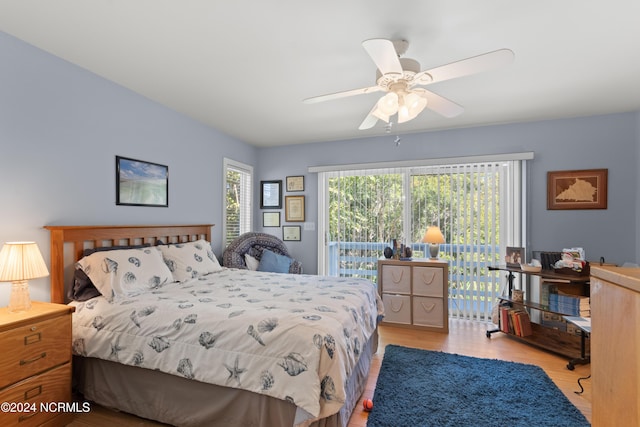 bedroom featuring ceiling fan and light hardwood / wood-style flooring