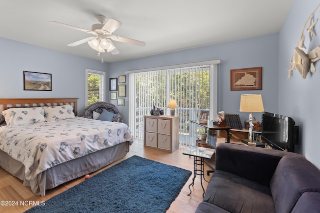 bedroom featuring ceiling fan and light hardwood / wood-style flooring