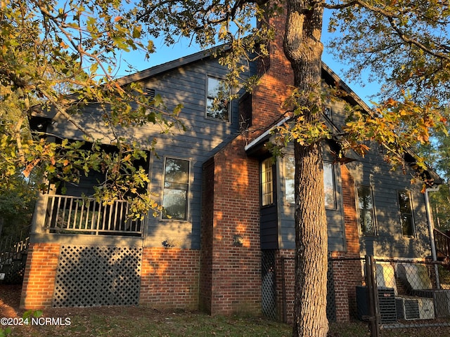 view of home's exterior featuring central AC unit