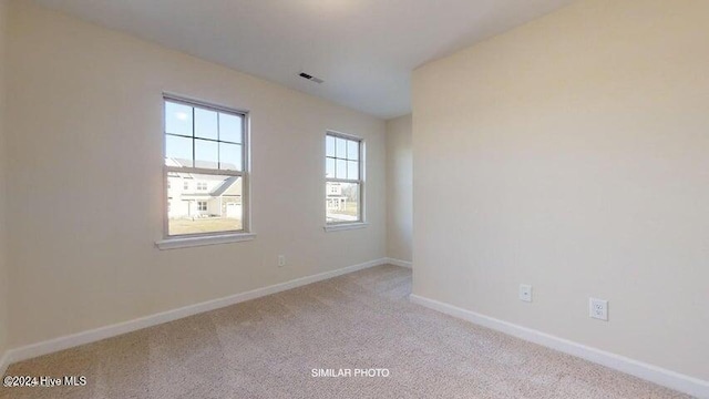 view of carpeted spare room