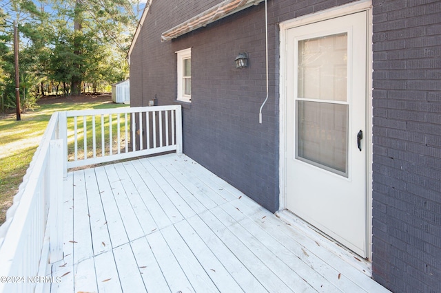 rear view of property with a deck