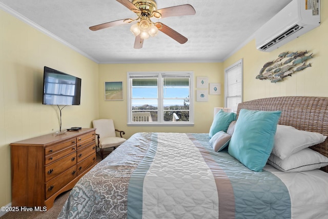 bedroom with crown molding, a textured ceiling, a ceiling fan, and an AC wall unit