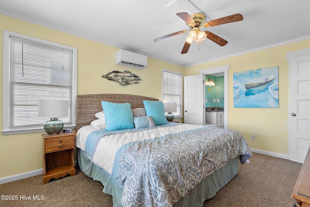 carpeted bedroom featuring ensuite bath, ceiling fan, baseboards, and an AC wall unit