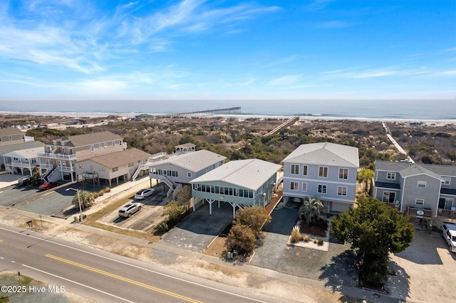 aerial view with a water view and a residential view